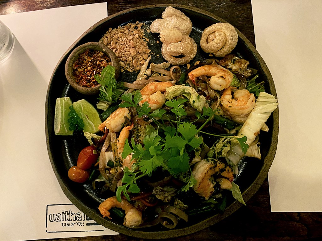 A plate of Thai food including rice and shrimp. Tiradentes, Minas Gerais, Brazil.