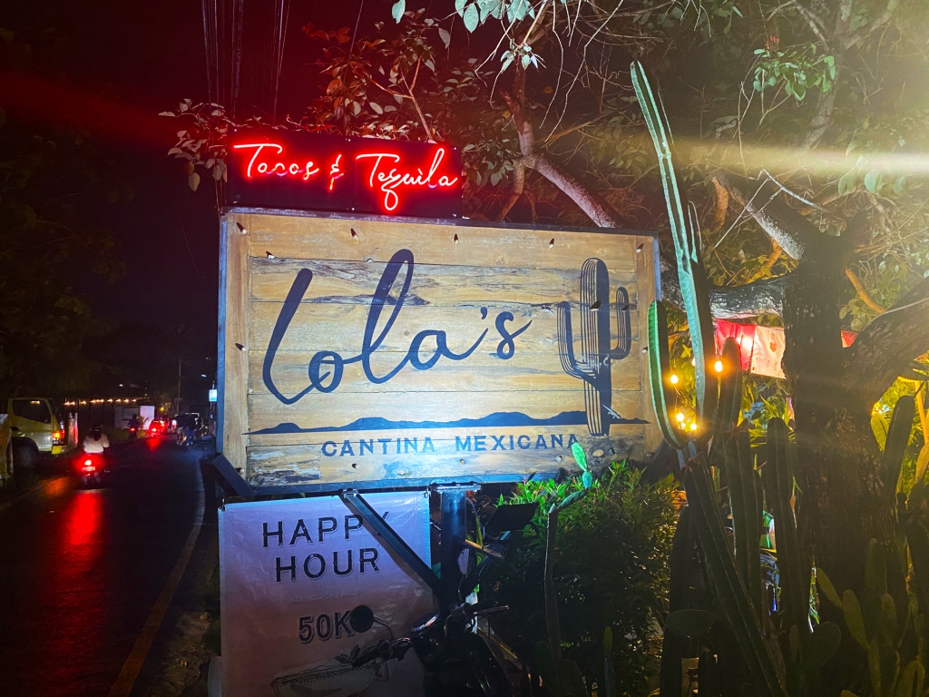 A restaurant sign that says Lola's Cantina Mexicana in Canggu, Bali.