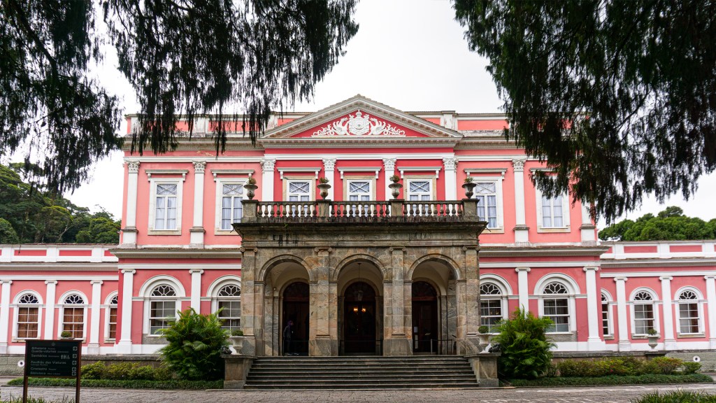 The Imperial family palace in PetrĂłpolis, Rio de Janeiro, Brazil. A pink palace with white trim.