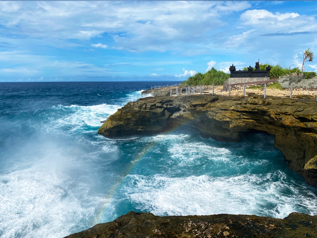 Devil's Tears in Nusa Lembongan, a small island off of Bali, Indonesia. The waves spray out of the crevices in the rock onto the cliffside.