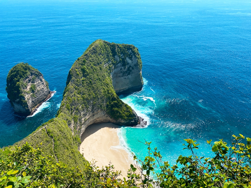 Kelingking Beach in Nusa Penida, a small island off of Bali, Indonesia. The rock formation resembles a T-Rex.