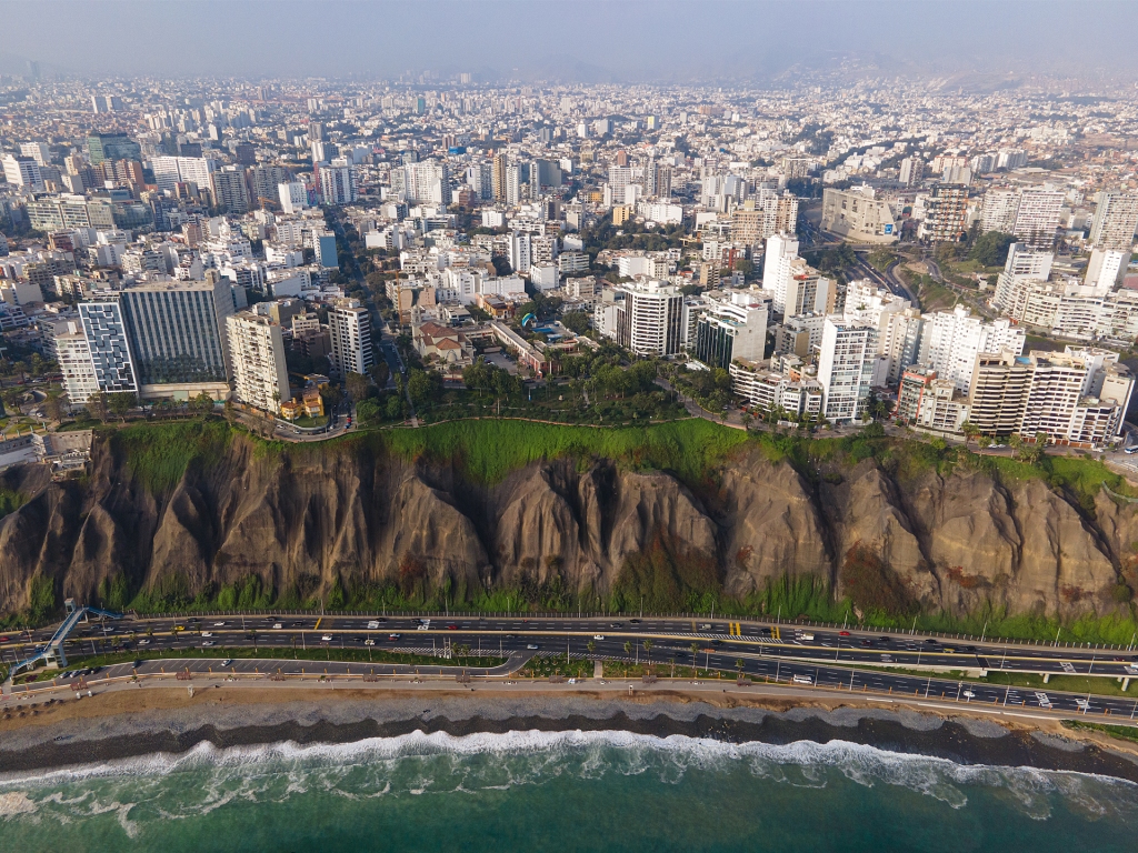 The city of Lima, Peru on top of a cliff along the pacific ocean.