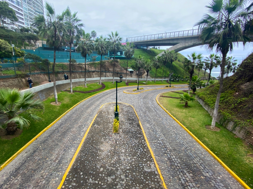 A road in the Miraflores neighborhood of Lima, Peru, leading out to the ocean.
