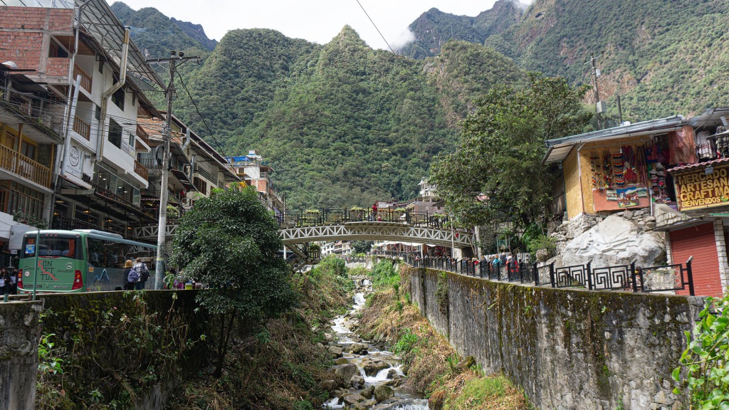 The town of Aguas Calientes, Peru. The town is separated by a river, then a bridge connects the two sides.