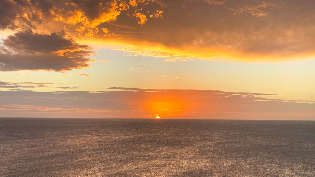 The sunset over the ocean from the view at Casa Pueblo in Uruguay.