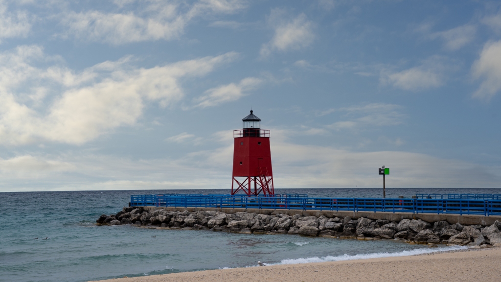 Small, red lighthouse in Charlevoix, Michigan.